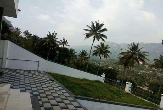 Hotel O Home Homeplus Summer Club bhk Peaceful Nature Munnar