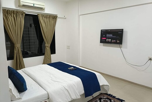 Tulsi Home Aesthetic Deluxe Room attached bathroom