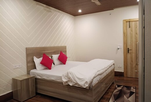 The Green Feather Residence 2BHK with a Kitchen