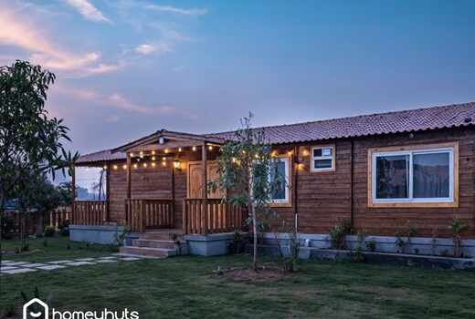 Luxury Wood House with Pool by Homeyhuts | 3BR