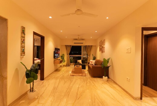 Elite 3BHK with Balcony Runway Views Near BKC by Iconic Stays