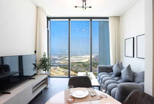 ELIVAAS Curated Stylish 1BR with Skyline Views | Sobha Crest