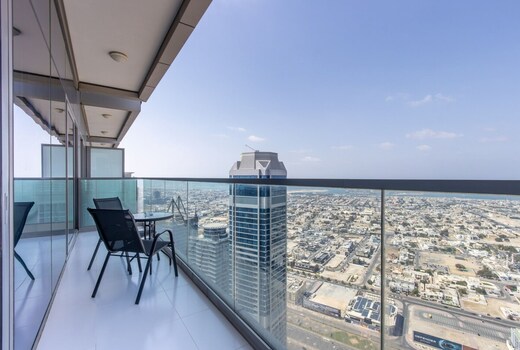 ELIVAAS Curated High-Floor 2BR | Skyline, Sea & Burj Khalifa View