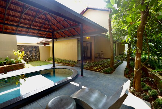 Tangerine Tales Boutique Resort by LexStays