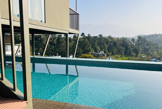 Western Ghats Holiday Homes | Mountain-view Rooms