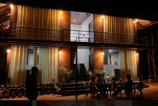 Tranquil glass house by Coorg Tree House