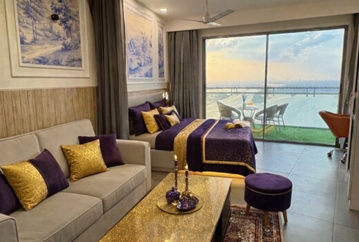 Grande by Zenith Suites | Luxury River View Studio Noida