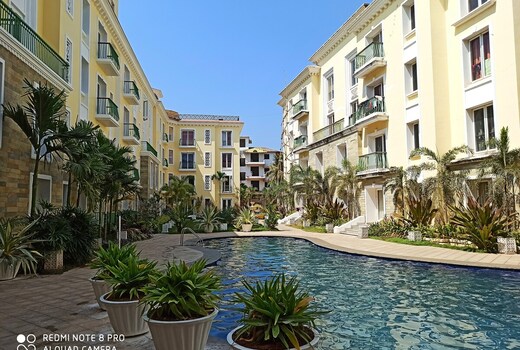 Elegant Pool View Apartment by Leela Homes
