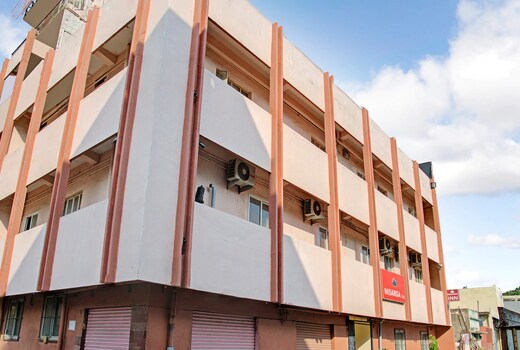 Nisarga Inn, KR Puram Railway Station