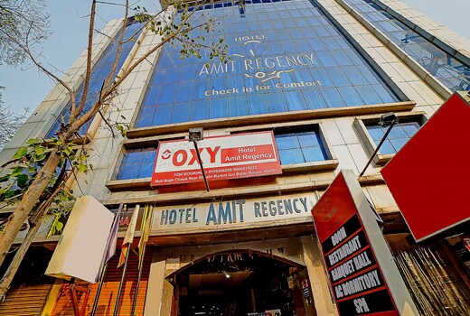 Capital O Convivial Hotel Amit Regency