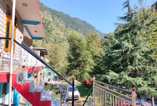 Tirthan river front farm stay.