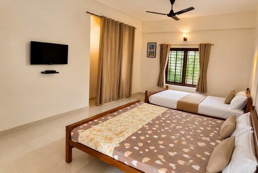 Vidhara Rooms | 5 min drive to KIMSHEALTH Hospital