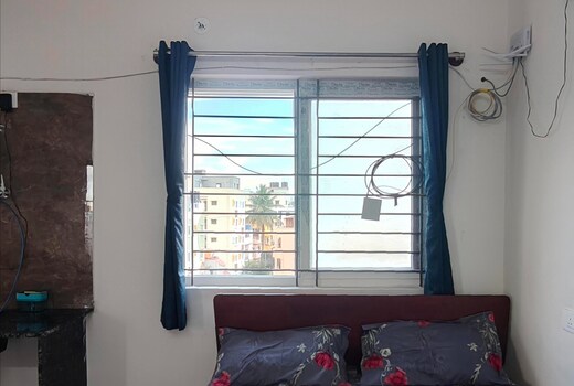 Compact BTM Layout Apartment by ANI living Spaces