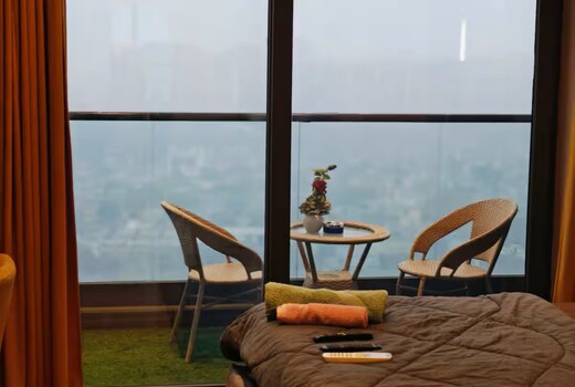 Lavish suite with balcony and city view