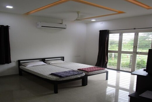 Karkare Holiday Home | Rooms & Restaurant