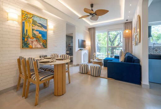 Cozy 2BR Candolim Escape | Pool, Gym & Hill Views | Hireavilla