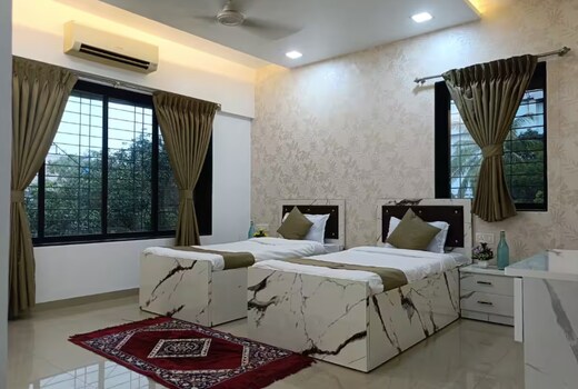 Tulsi Home Aesthetic Deluxe Room with attached bathroom