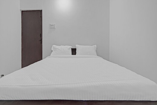 Hotel O ACS Inn