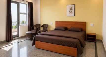 Aaradhya residency Room Type - Deluxe AC room