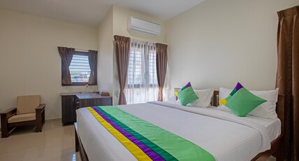 Treebo Samanvaya Retreat, Mysore Room Type - Deluxe Room with Balcony