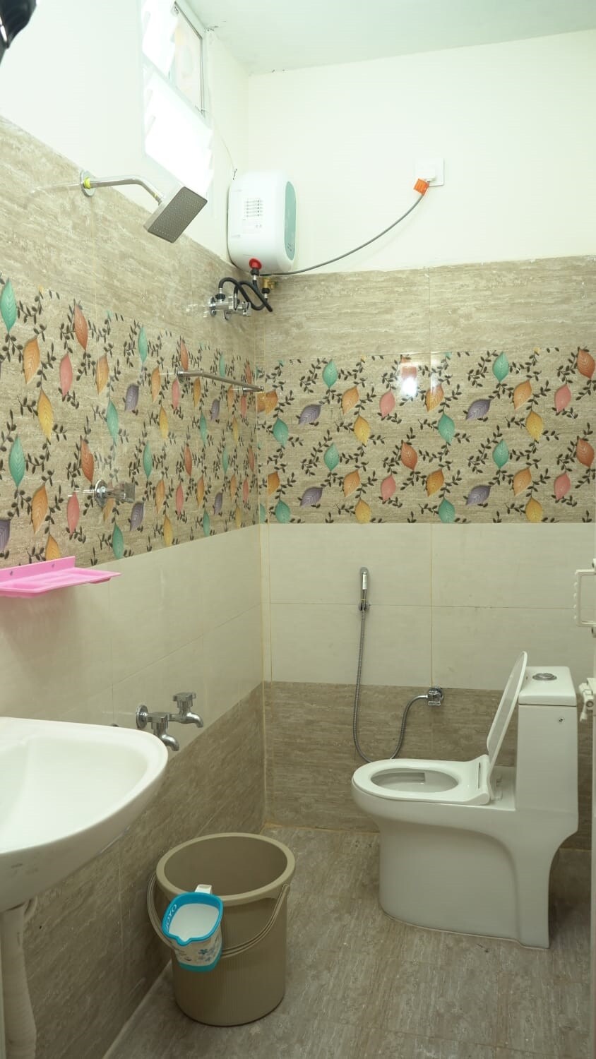 Hotel Dhanalakshmi Elite - Tap to explore photos