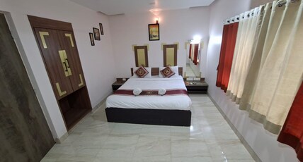 Hotel Laxmi Residency Room Type - AC Deluxe Room With Bathtub