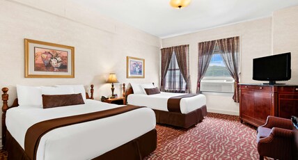 Genetti Hotel, SureStay Collection by Best Western Room Type - 2 Double Beds, Non-Smoking, Exterior Entrance, Pool View, Flat Screen Television, Desk, Microwave An Genetti Hotel, SureStay Collection by Best Western Room Type - 2 Double Beds, Non-Smoking, Exterior Entrance, Pool View, Flat Screen Television, Desk, Microwave An