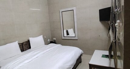 Hotel Asha Room Type - Standard Room Non Ac Hotel Asha Room Type - Standard Room Non Ac