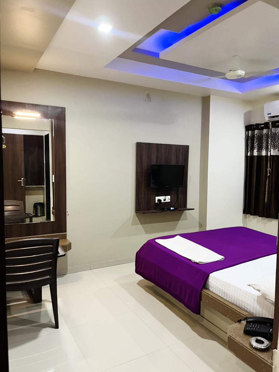 Hotel Raj Heights - Tap to explore photos