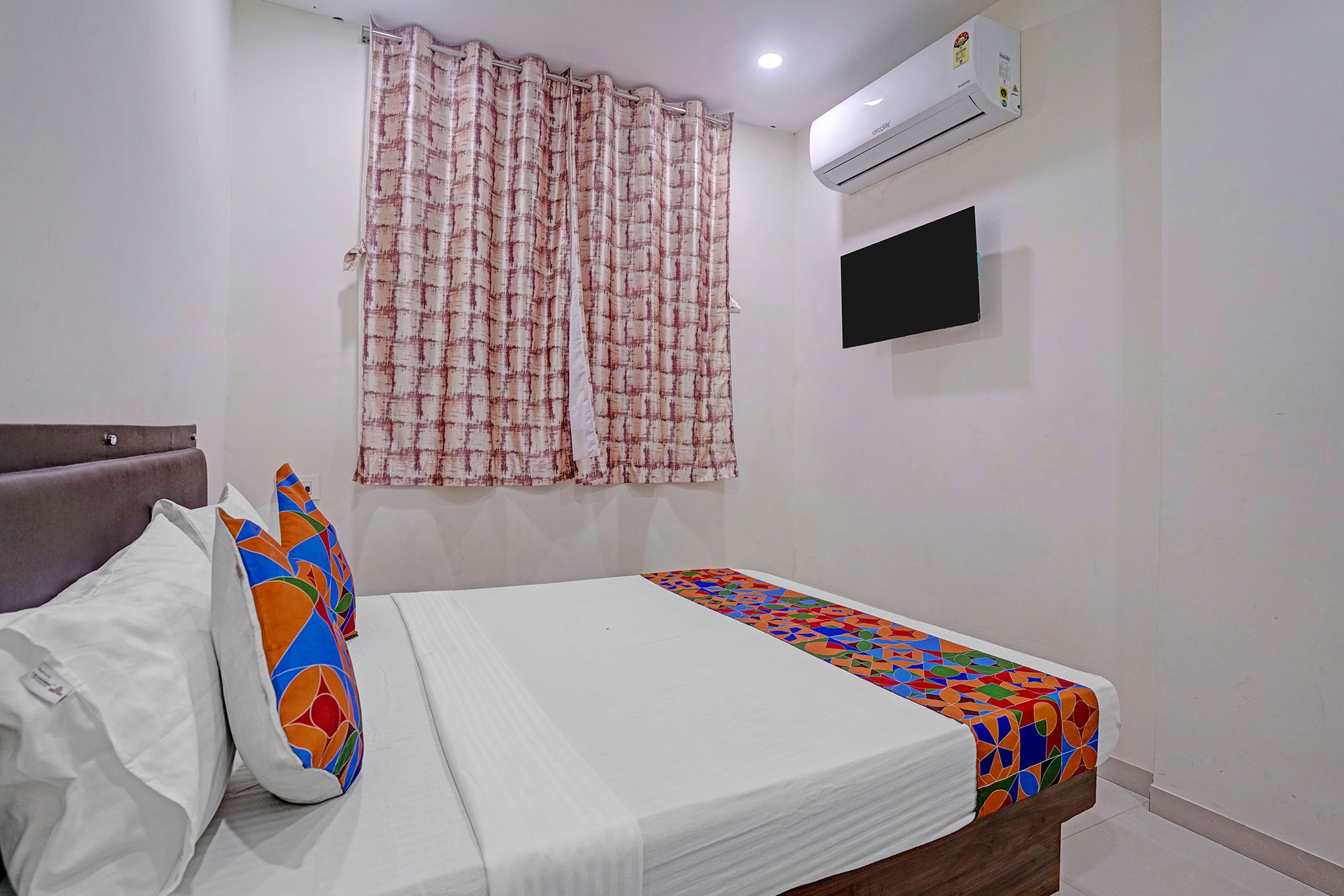 FabHotel Elegance Inn - Tap to explore photos
