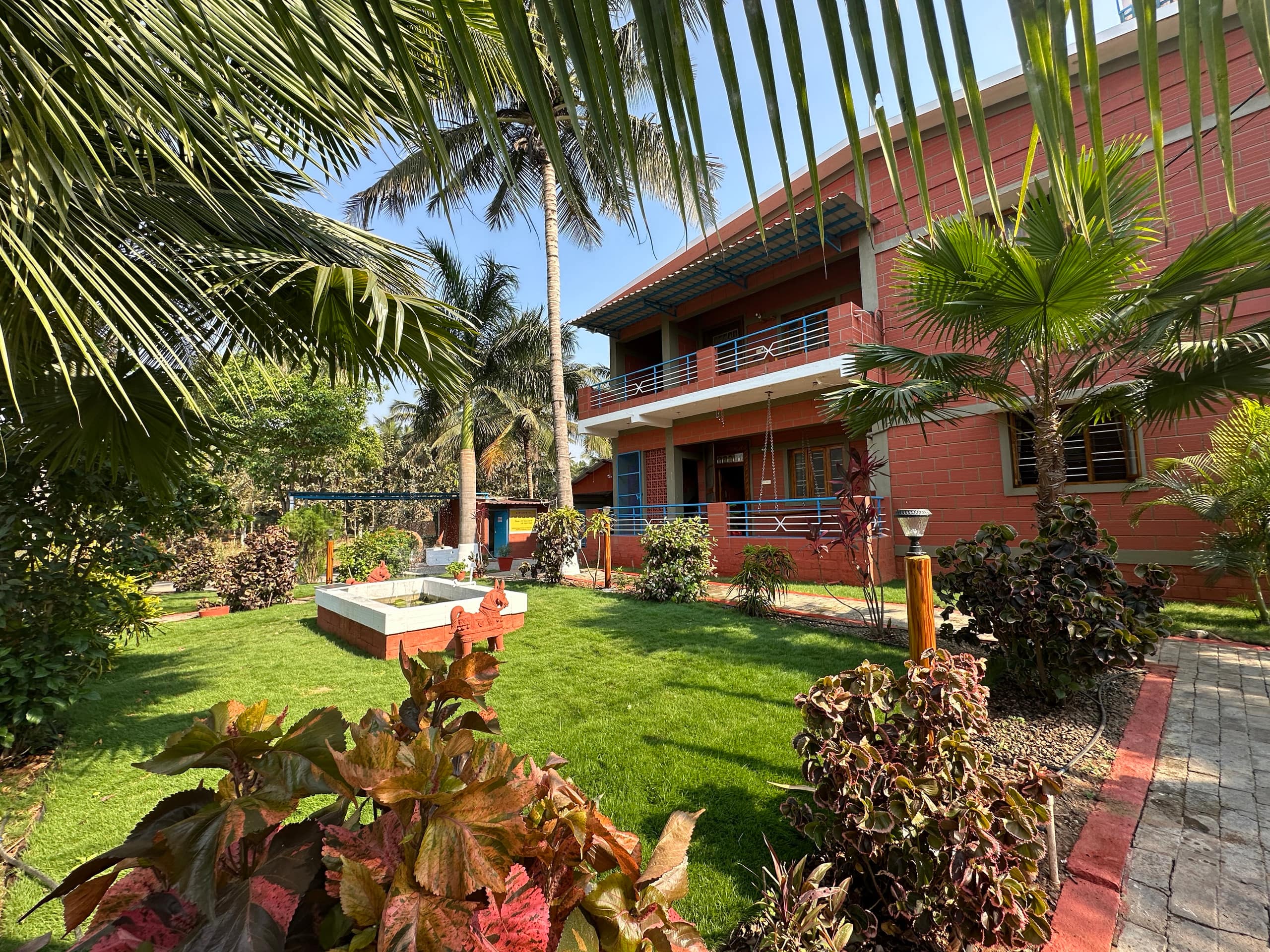 AUM Shanthi Farmstay Near Isha Adiyogi Coimbatore - Tap to explore photos