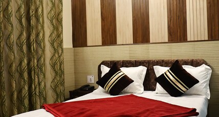 Sanyal Inn Room Type - Deluxe Room