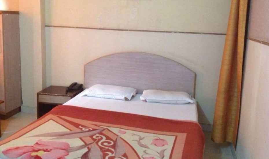 Hotel Abhinandan - Tap to explore photos