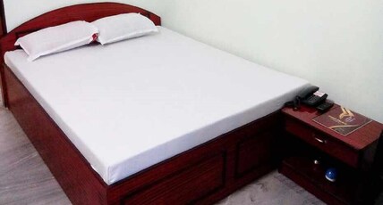 Pooja Palace Hotel Room Type - Deluxe room