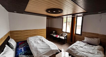 HOTEL PAWANI Room Type - Triple Sharing Deluxe Room