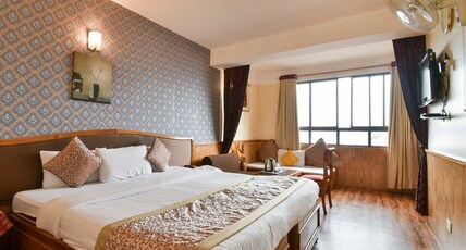 Jain Group Royal Residency (2 min walk to mg marg) Room Type - Family Deluxe Room Jain Group Royal Residency (2 min walk to mg marg) Room Type - Family Deluxe Room