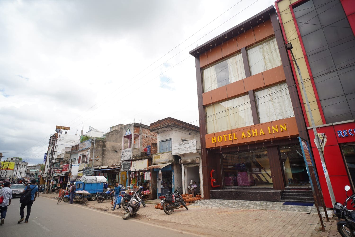 Hotel Asha Inn - Tap to explore photos