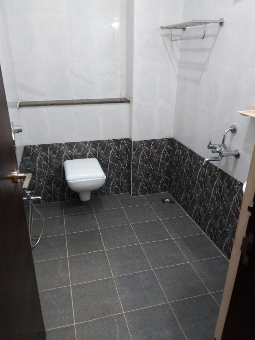 Dhanaram A/C Rooms - Tap to explore photos
