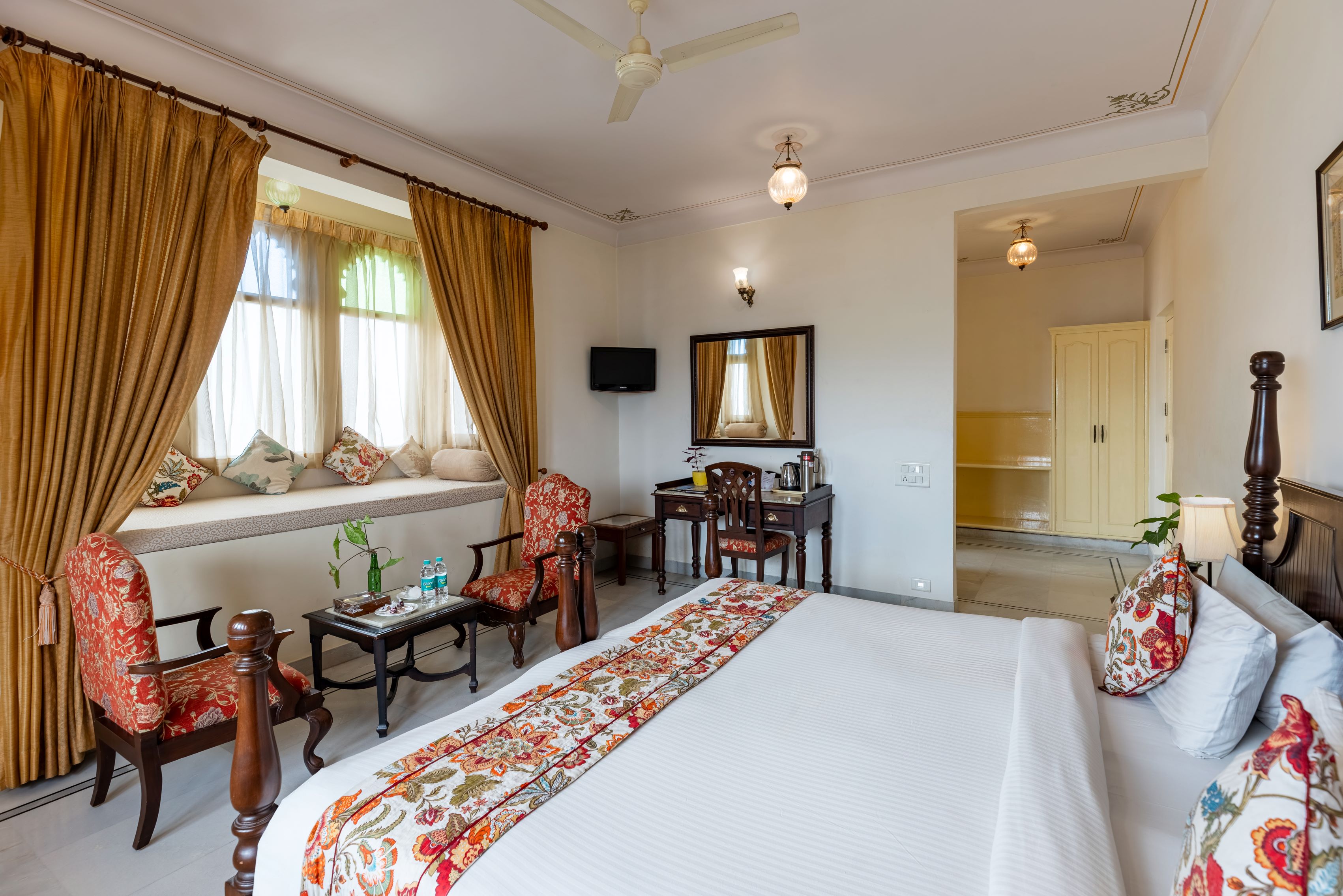 Akshay Niwas Hotel by Amantra | Pool & Lake - Tap to explore photos