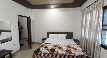 Rajlaxmi Homestay Room Type - Deluxe Queen Room