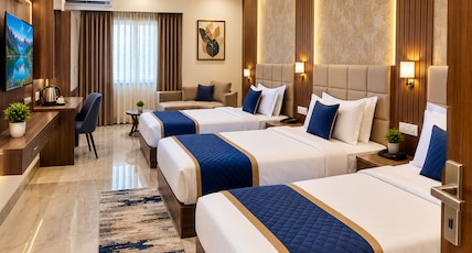 Hotel Smart Plaza By SMART GROUP Room Type - Family Suites With 4 Bed Hotel Smart Plaza By SMART GROUP Room Type - Family Suites With 4 Bed