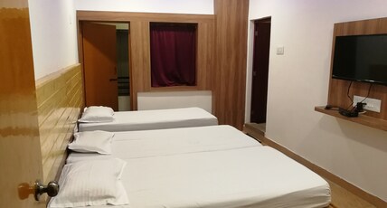 Hotel Zhanana Inn Room Type - Deluxe Triple Non AC