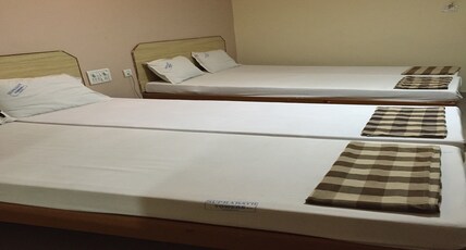 Hotel  Suprabath Towers Room Type - 4 Bedded Non AC Family Room