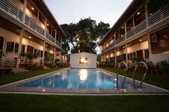 White Flower Pool Facing Cottages