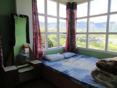 Lama Tsekhang Homestay (Valley View Room) - Tap to explore photos