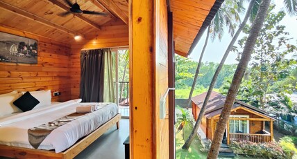 Trideus Riviera-Riverside Resort, Candolim,Goa Room Type - Riverside Chalet with Balcony & Bath Tub — River-Facing Trideus Riviera-Riverside Resort, Candolim,Goa Room Type - Riverside Chalet with Balcony & Bath Tub — River-Facing