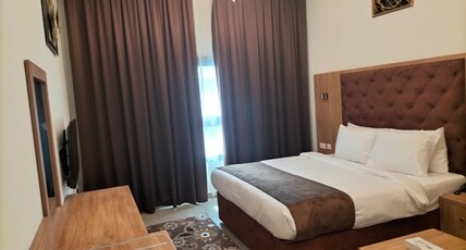 NEW DREAM PLAZA HOTEL APARTMENT Room Type - STUDIO DELUXE