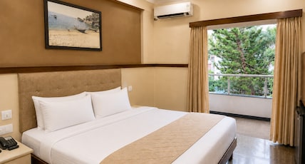 Summerville Beach Resort- Near Candolim Beach Room Type - Deluxe Room with Balcony Summerville Beach Resort- Near Candolim Beach Room Type - Deluxe Room with Balcony