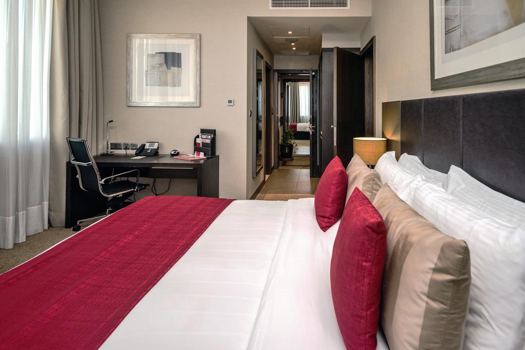 Ramada Abu Dhabi Downtown - Tap to explore photos