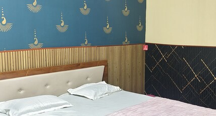 Anjali Palace and Suites Room Type - Deluxe AC King Bed